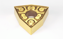 WNMG 080404-TF IC507-Double-sided trigon insert, positive rake angle that varies along the edge to negative in order to prevent chipping. Special design reduces cratering. Used for carbon and alloy steel, stainless steel and high temp. alloys.