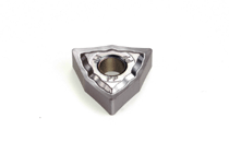 WNMG 080408-PP IC907-Double-sided trigon inserts with a positive rake angle and sharp, positive-radial edge. Used for machining very ductile materials such as aluminum alloys, soft, low carbon steel, stainless steel, and high temperature alloys.