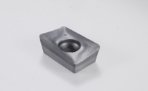 APKT 100312TR-RM IC28-HELIMILL inserts with different corner radii and a reinforced cutting edge for interrupted cut and heavy machining.