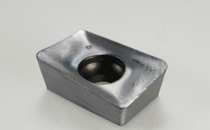 APKT 100312TR-RM IC328-HELIMILL inserts with different corner radii and a reinforced cutting edge for interrupted cut and heavy machining.
