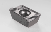 ADKT 1505PDTR-76 IC950-HELIMILL general use milling insert with reinforced helical cutting edges and ribs on the rake face to reduce heat transfer. Used for interrupted cuts and heavy machining.